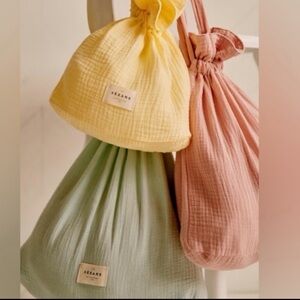 COPY - Sezane medium Travel Bag. Pastel pink, yellow and green